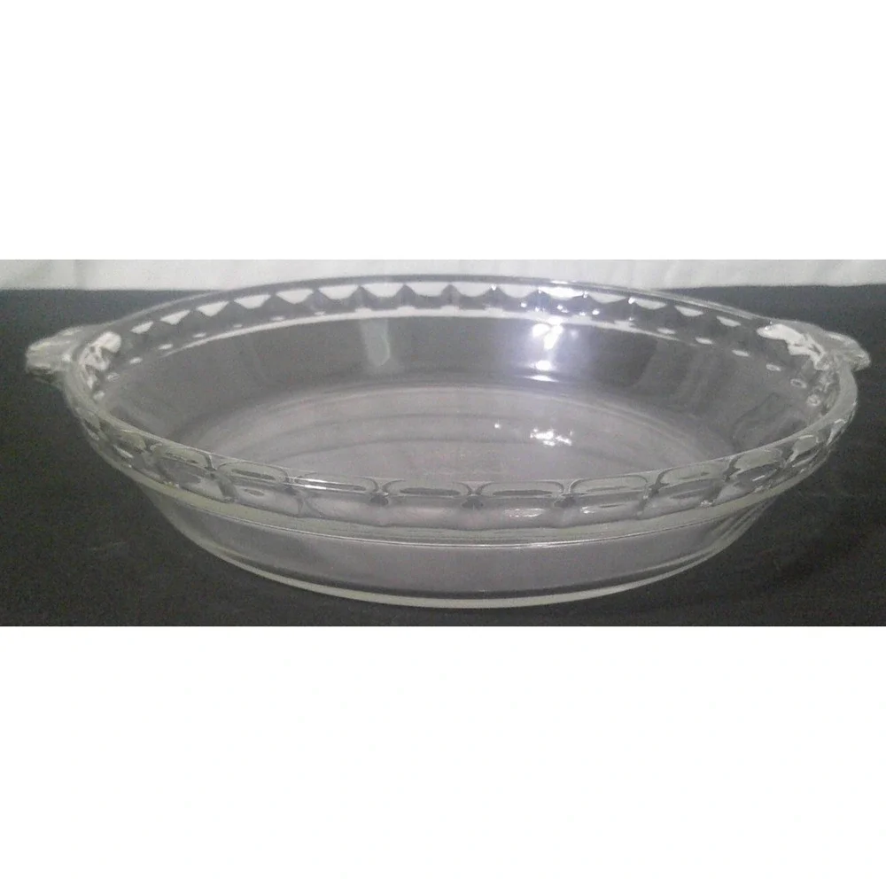 Pyrex 229 9.5-inch clear glass pie dish in good condition